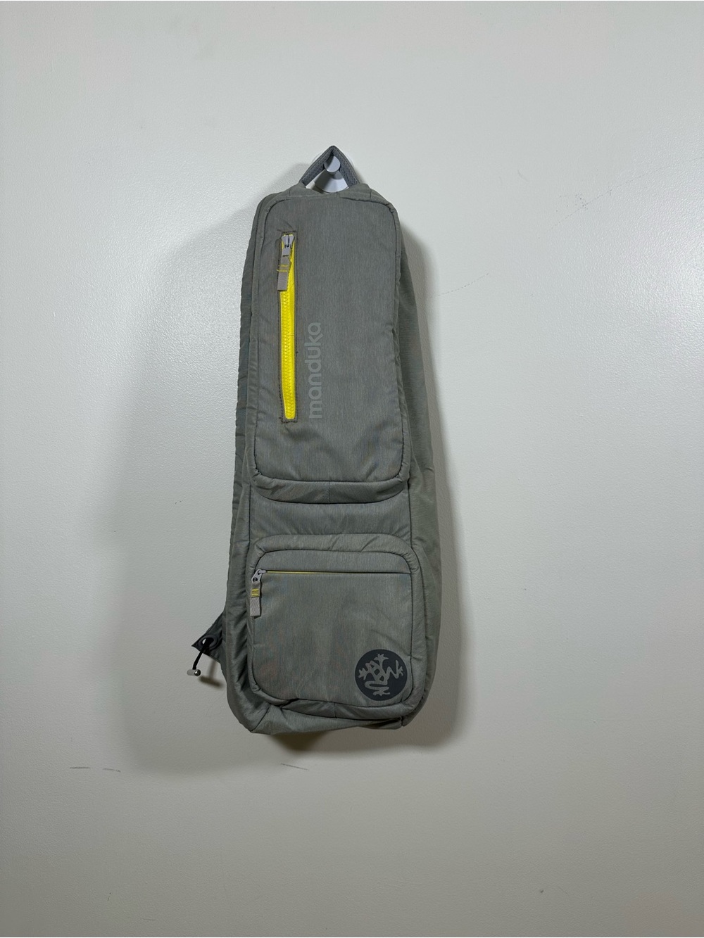 Manduka GO ROAM Gray Sling Belt Bag with Yellow Zip Accent